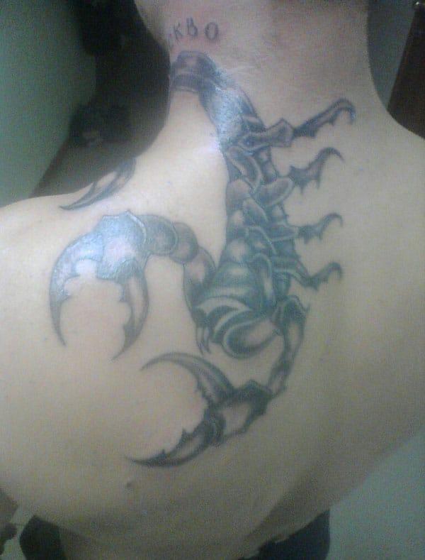 scorpion tattoo on neck