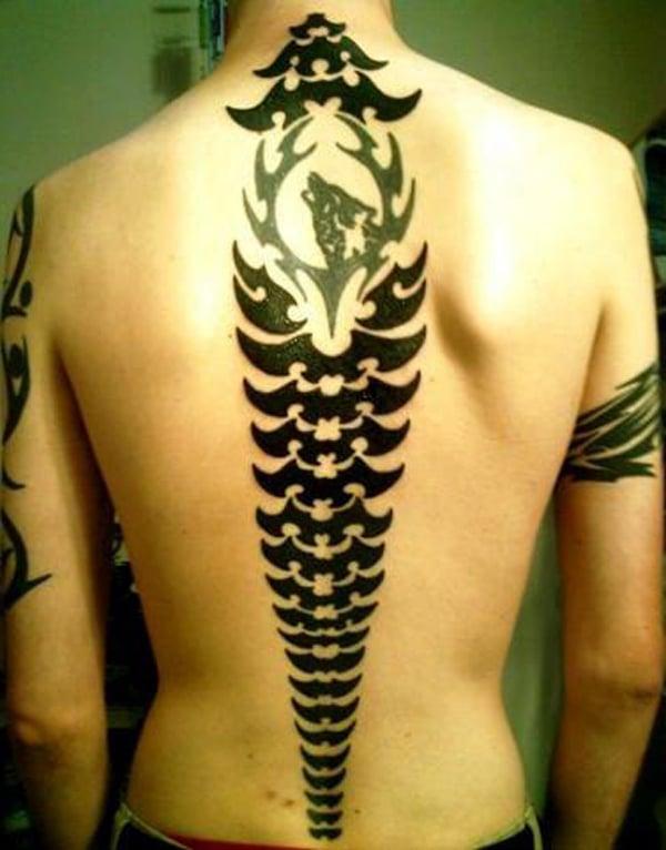Spine tattoo on the back brings the spruce appearance