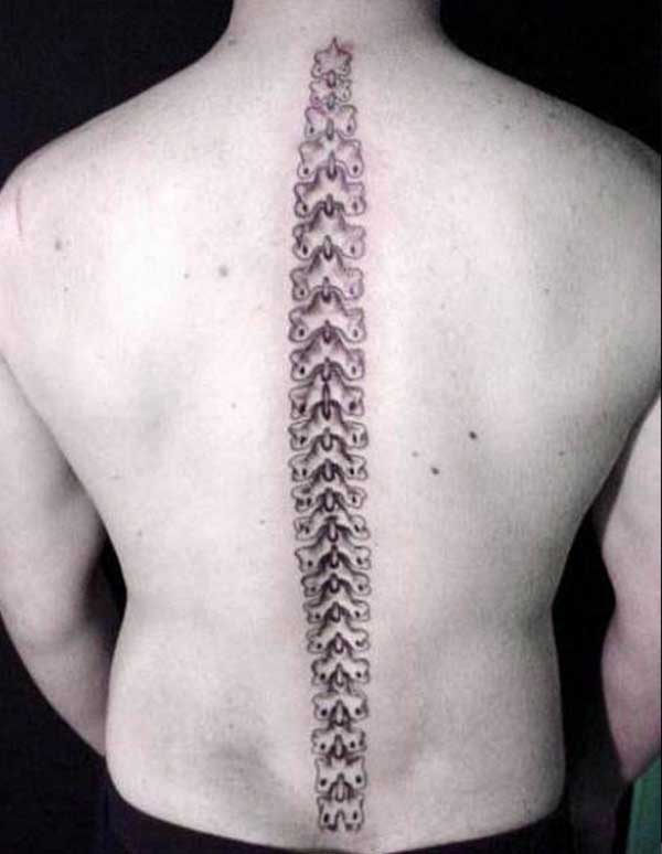 Spine tattoo on the back brings the magnificent look