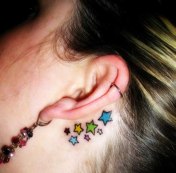 star behind the ear tattoos