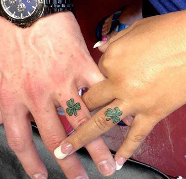 matching finger tattoos