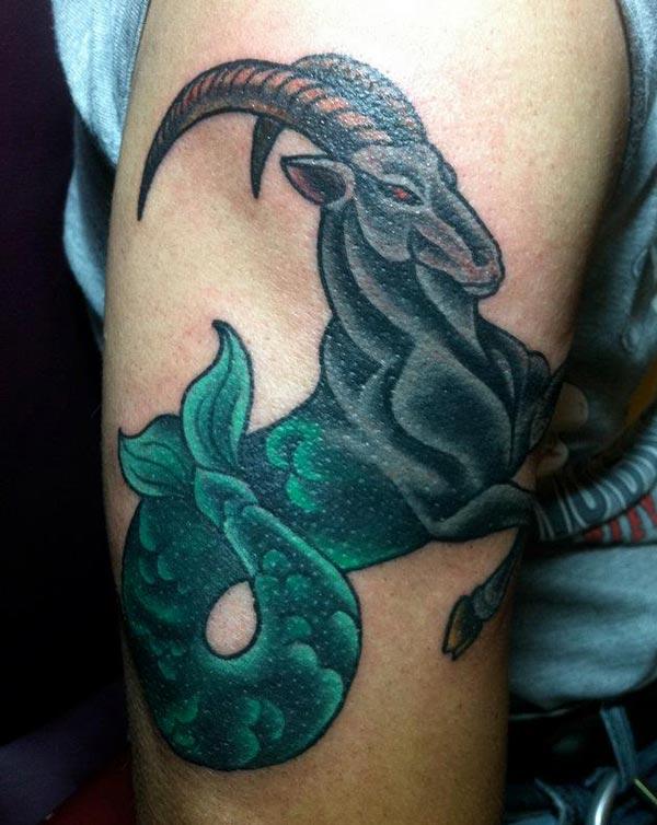 Capricorn tattoo on the right arm make a man look cool