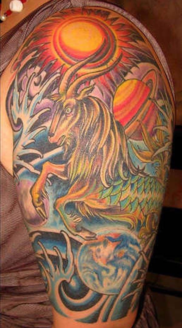 Capricorn tattoo on the upper arm with this design ink make a man look stylish
