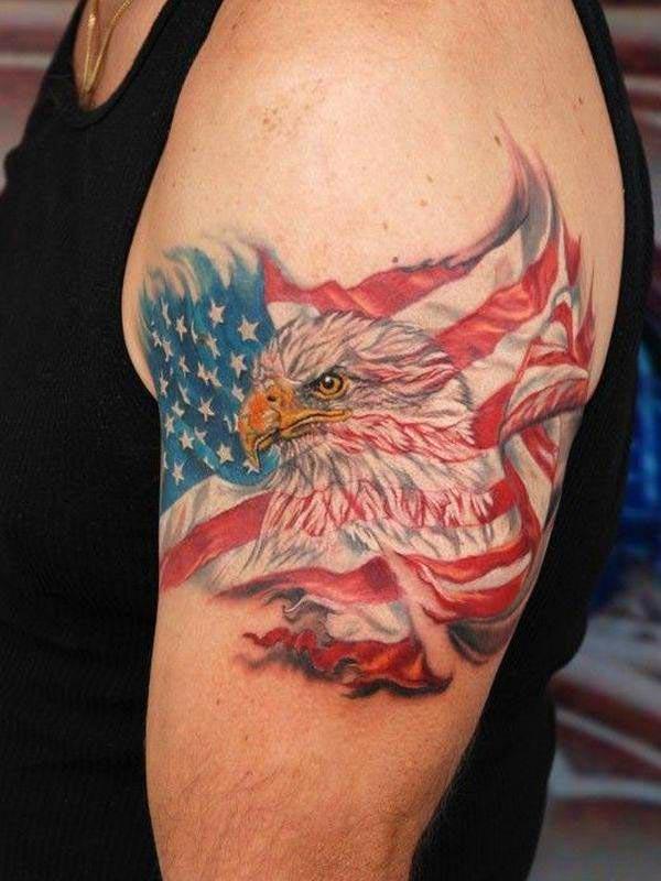 American Flag Tattoo with an eagle ink design on the upper left arm shows the man’s passionate nature on eagle