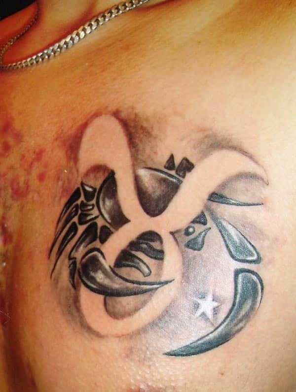 Cancer Zodiac Tattoo on the upper chest makes a man look august 