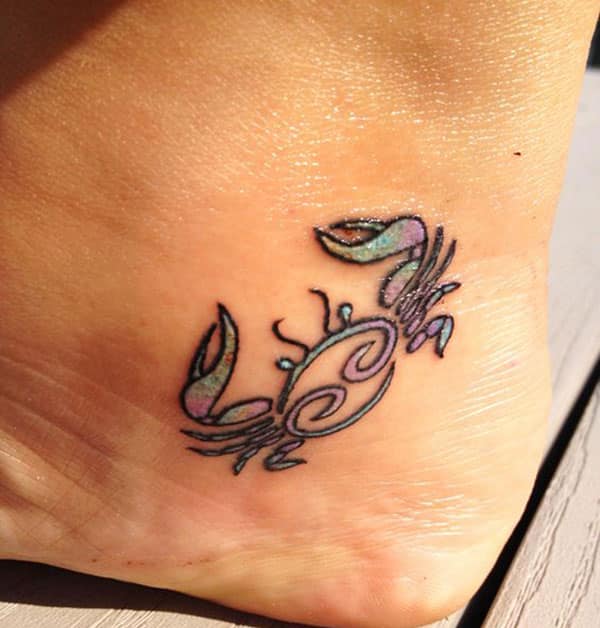 Makes a divine Cancer Zodiac Tattoo on foot to flaunt it