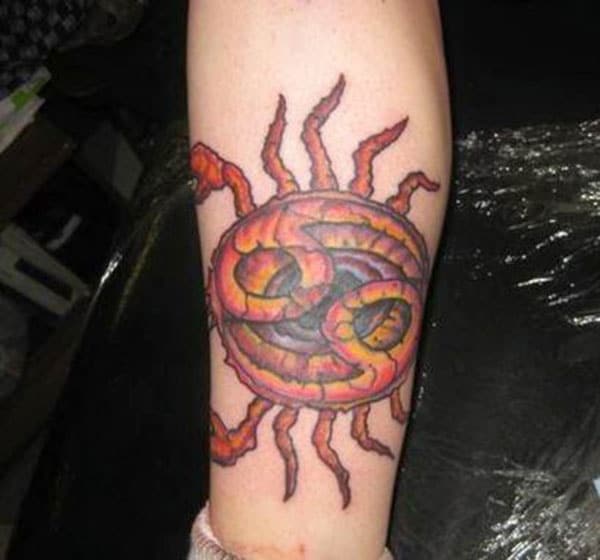 Cancer Zodiac Tattoo on the foot make a man look swagger