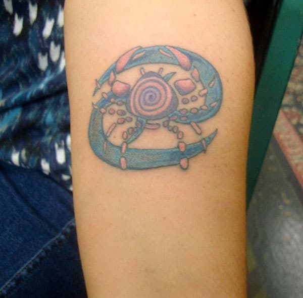 Cancer Zodiac Tattoo on the front lower arm make a girl look exquisite 
