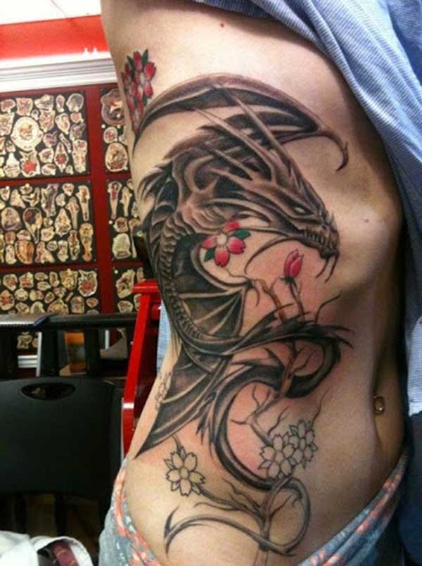 the girl with the extraordinary dragon tattoo design on her side