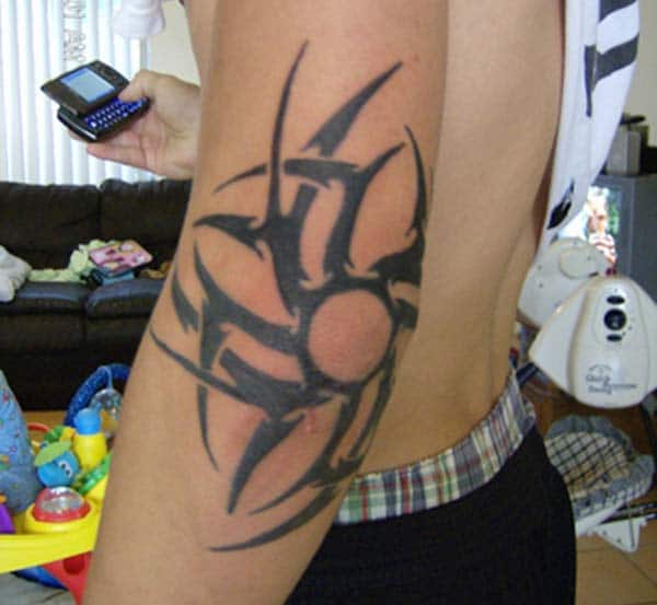 tribal elbow tattoo design for men