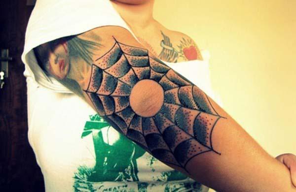 spider web tattoo on women elbow