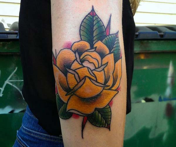 yellow rose tattoo design idea for girls on the elbow
