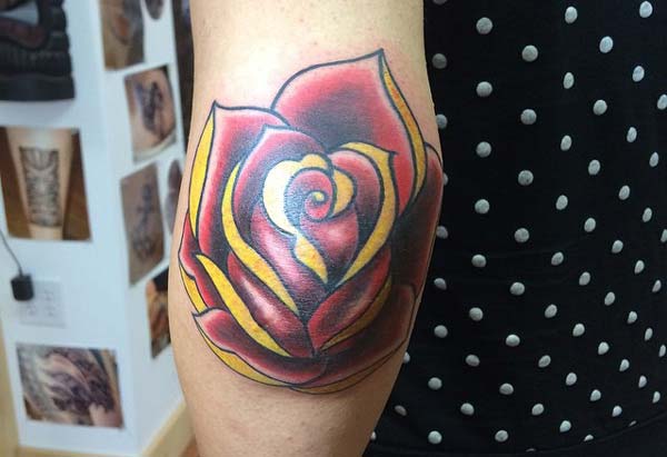 colorful rose elbow tattoo ink idea for women’s