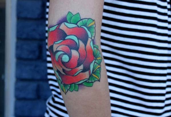 cool rose elbow tattoo design idea for girls