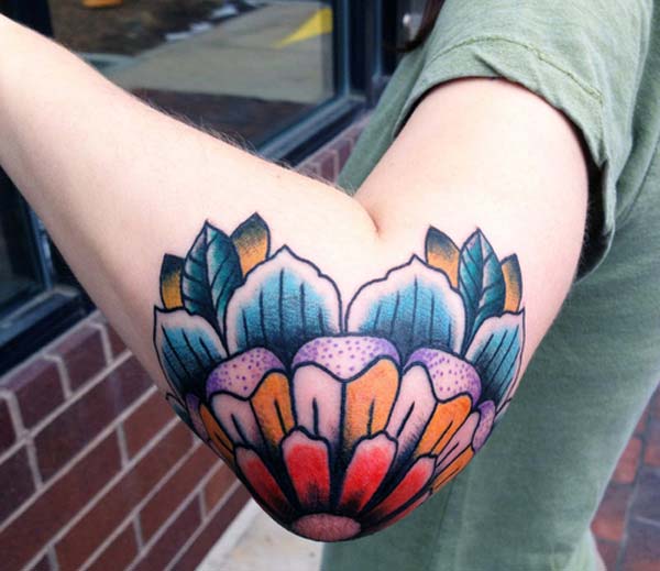 traditional colorful elbow tattoo ink idea for girls