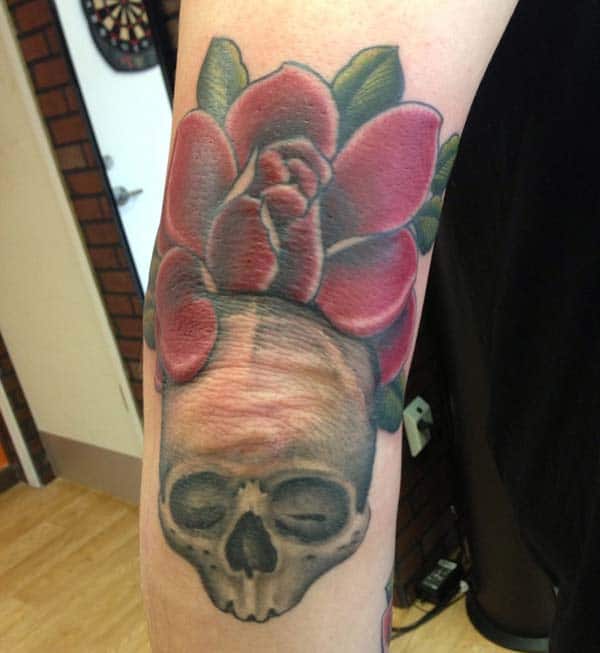 skull elbow tattoo ink idea for the ladies