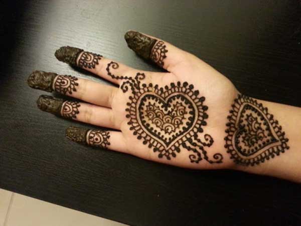 Cute henna mehndi tattoo design on hand