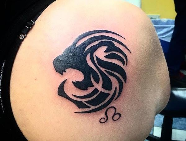 The Leo Tattoo on the back shoulder has got a black ink design that make a lady look gorgeous