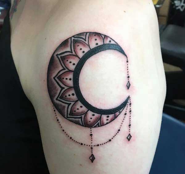 Moon tattoo ink idea on shoulder for girl