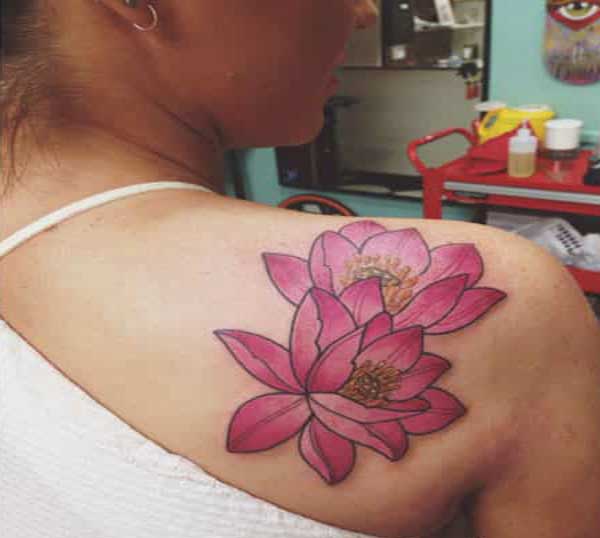 lotus flower tattoo idea on shoulder for women