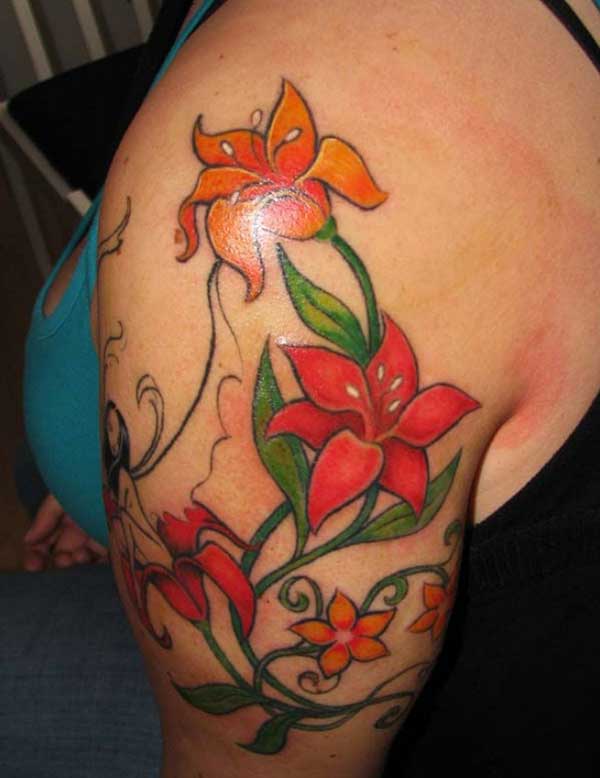 Flower tattoo idea on shoulder for women