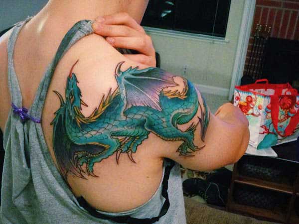Dragon tattoo idea for womens shoulder