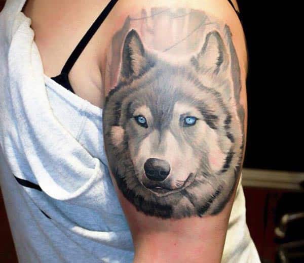 Wolf shoulder tattoo idea for women
