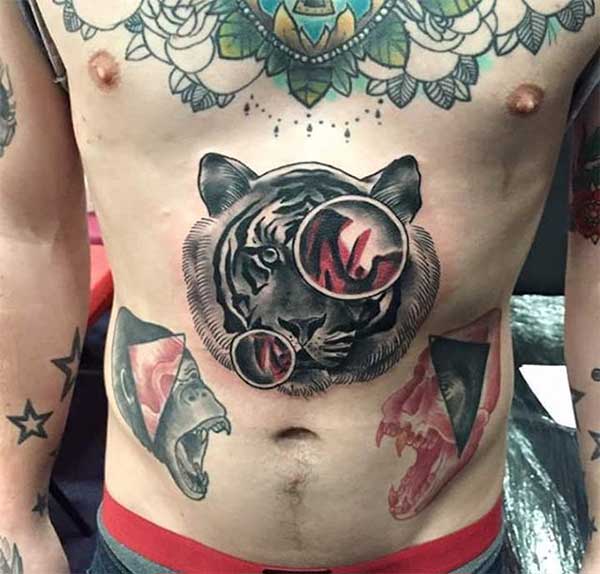 mens stomach tattoos