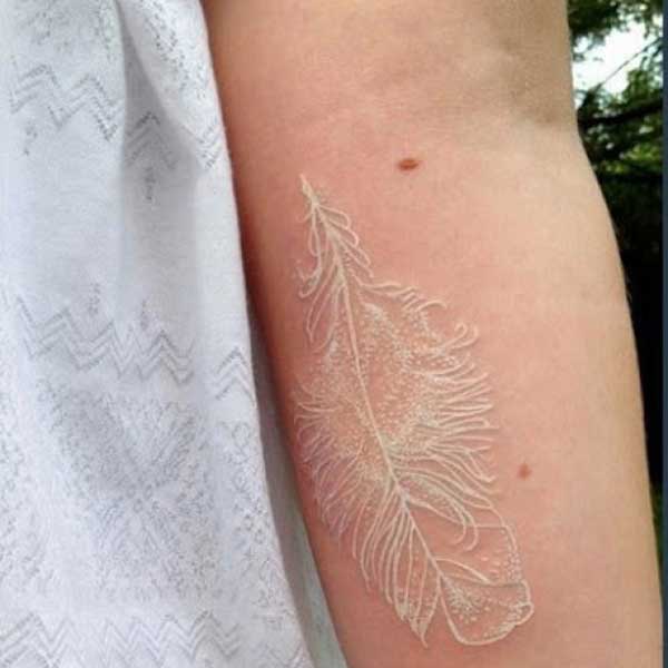 white feather tattoos