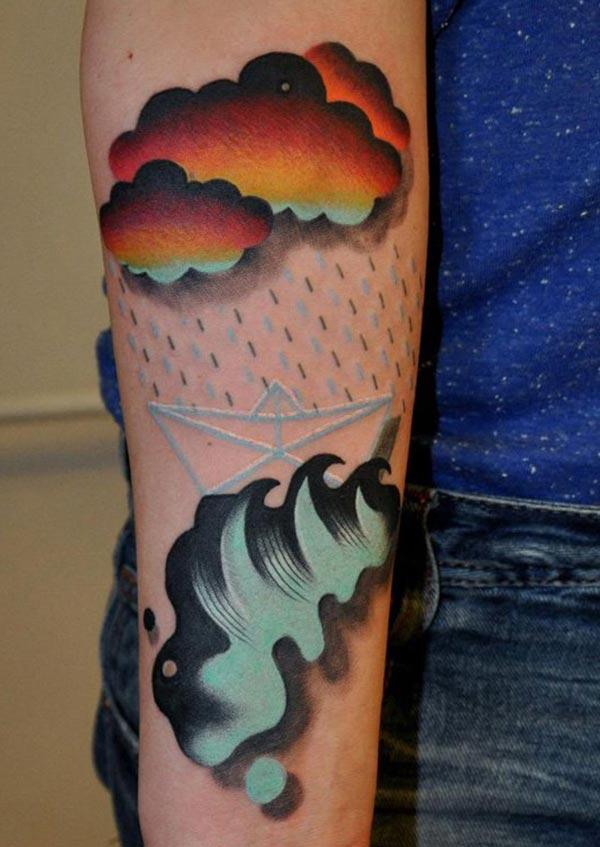 Cloud Tattoo on the arm makes a man look gallant