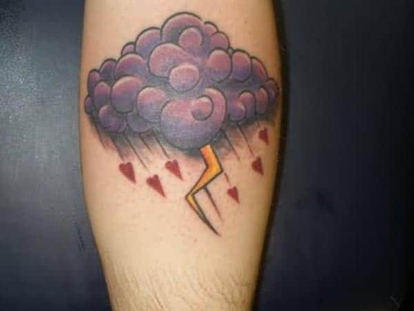 Cloud Tattoo for men with purple ink design makes a man look classy
