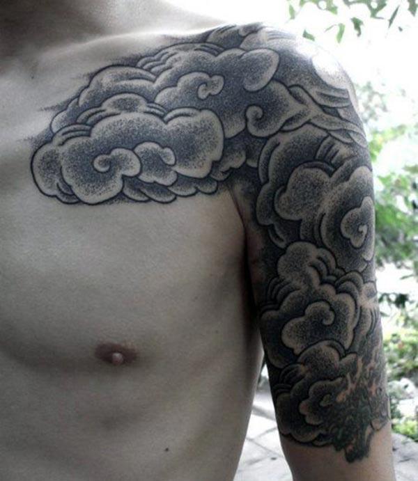 Cloud Tattoo on the shoulder makes a man look glamourous 