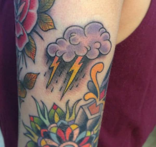 Cloud Tattoo for men with a purple ink design make them look foxy