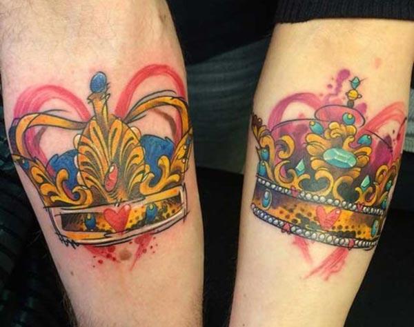 King and Queen Tattoos on the arm make couples look radiant and captivating