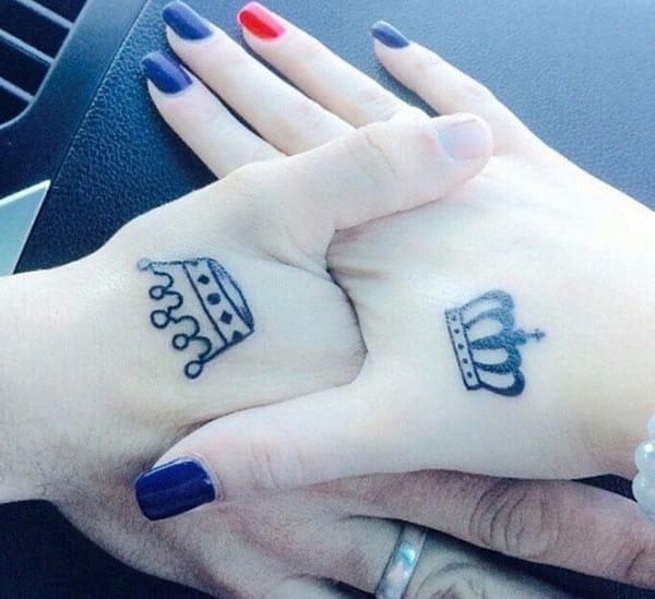 King and Queen Tattoos on the hand makes a couple look captivating