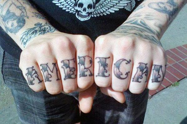 Knuckle Tattoo with the writing make a man look stylish