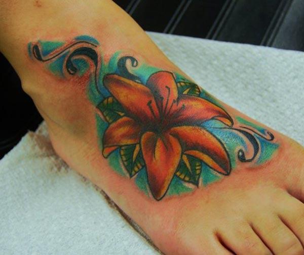 Makes a divine Lily tattoo on foot to flaunt it 