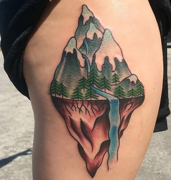 Mountain Tattoo on the thigh makes a woman look lovely