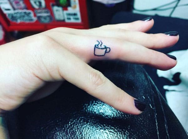 Tiny tattoo on the finger brings about the memory or makes it as a reminder