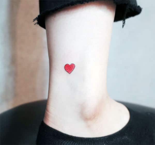 Tiny tattoo with a pink love ink design, tattoo on the foot brings the captivating look