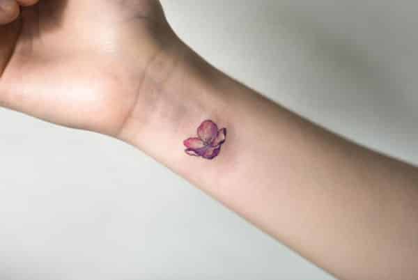 Tiny tattoo on the wrist brings the astonishing look