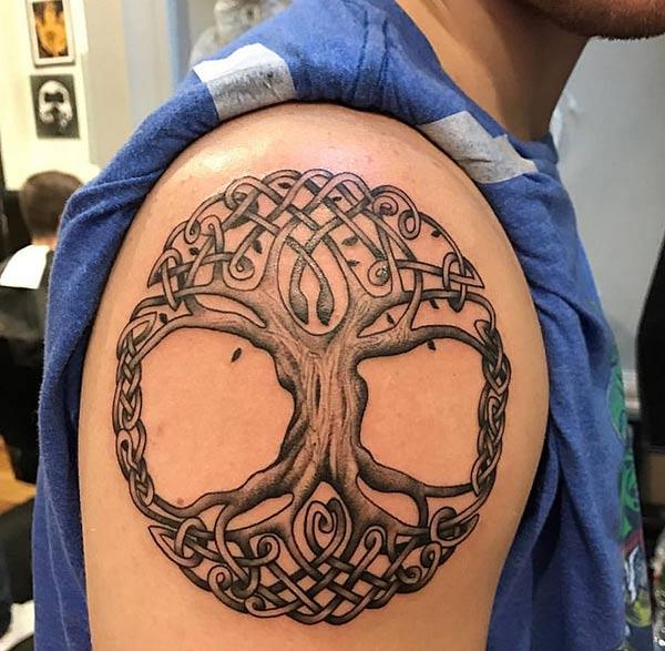 The Tree of Life tattoo on the shoulder make a man look hypnotic