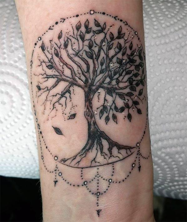Brown girls will love the black ink design Tree of Life tattoo on their low...