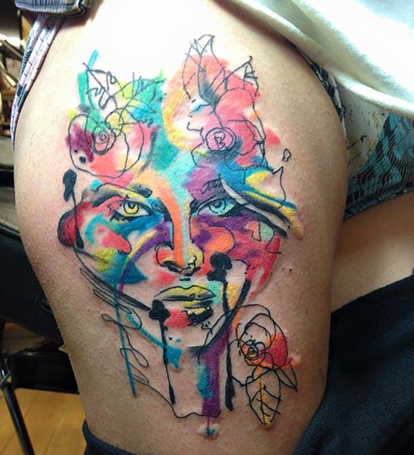 Watercolor tattoo on the side thigh brings the sexy and attractive look