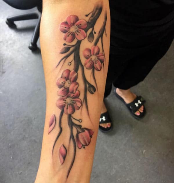 Cherry Blossom on the lower arm makes a lady look exquisite