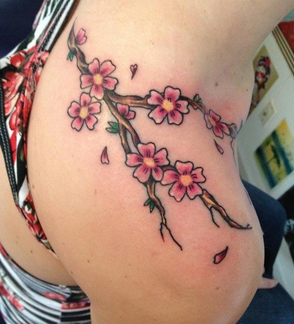 Cherry Blossom on the shoulder brings the feminist look