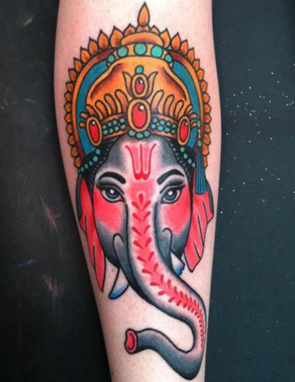 Colorful Lord Ganesha tattoo ink idea on hand