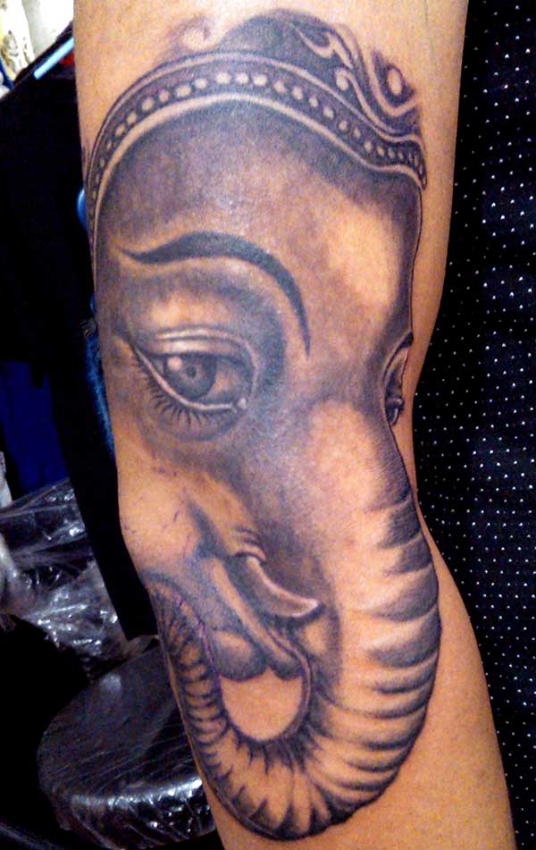 Black and white Ganesh tattoo ink idea for men