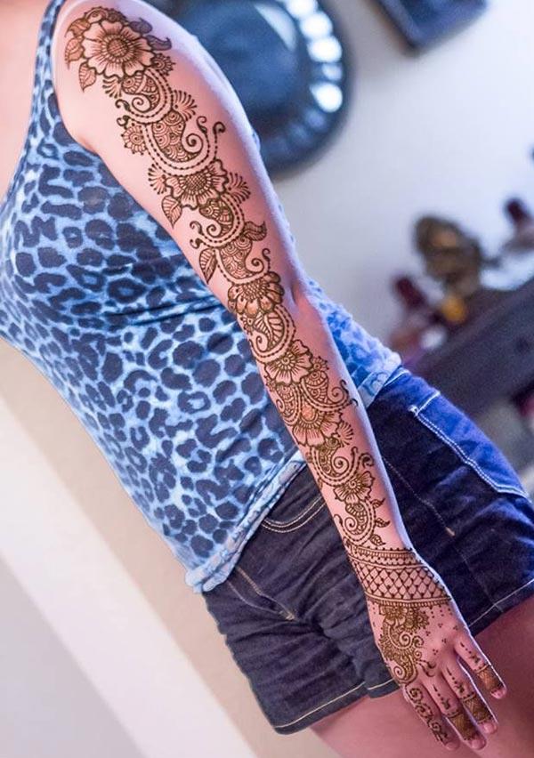 Full arm Mehndi tattoo designs idea