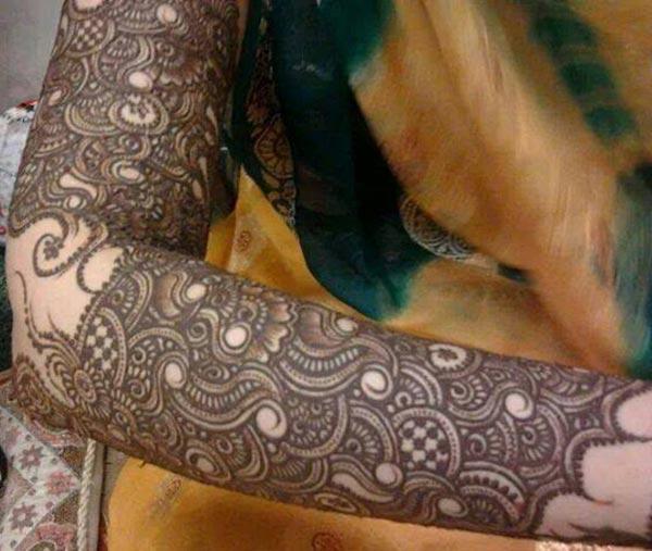 Full arm Mehndi tattoo designs idea